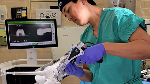 dr. daniel chan using velys robot for knee replacement